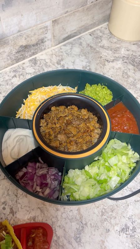 My Lazy Susan Taco bar is a game changer and great for Taco night! 6 compartments for all your favorite toppings and a bowl in the middle that plugs in and keeps your meat warm! This would also make a great Mother’s day gift! @amazon #amazonfind | kitchen essentials 

#LTKhome #LTKfindsunder50 #LTKsalealert