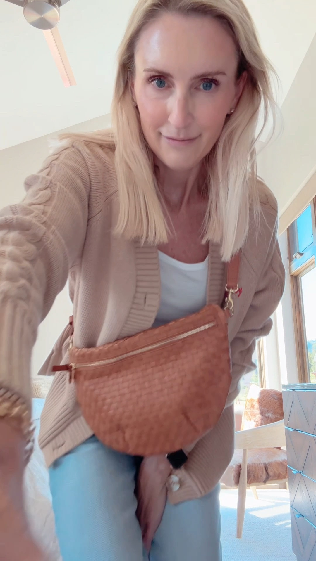 Travel outfits. Tavel outfit. Over 40 outfits. Wearing size 25 jeans. Small tops. My family and I each have a luggage set. We have it in black, pink, and this brown. I also have a backpack and a smaller roller bag. ￼

#LTKootd #LTKmomlife #LTKOver40