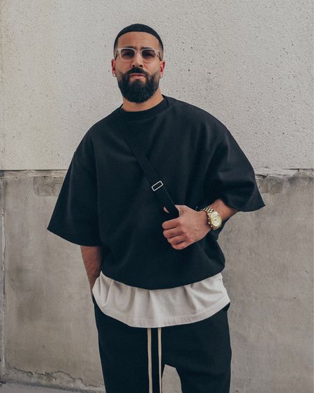SALE 🚨 similar glasses and exact layering tee currently on sale up to 80% off… FEAR OF GOD Eternal Collection Overlapped Cut Sleeve Crewneck Sweatshirt in ‘Black’ (size M), 7th Collection Allstars Henley in ‘Vintage White’ (size M), and Eternal Collection Relaxed Cotton Jersey Sweatpants in ‘Black’ (size M). FEAR OF GOD x BIRKENSTOCK Los Feliz sandals in ‘Taupe’ (size 41). FEAR OF GOD x BARTON PERREIRA glasses in ‘Matte Taupe’. THE ROW Slouchy Banana Bag in ‘Black’. A relaxed and elevated men’s look that is comfortable and cozy for a day out this Spring. 

#LTKstyletip #LTKmens #LTKsalealert