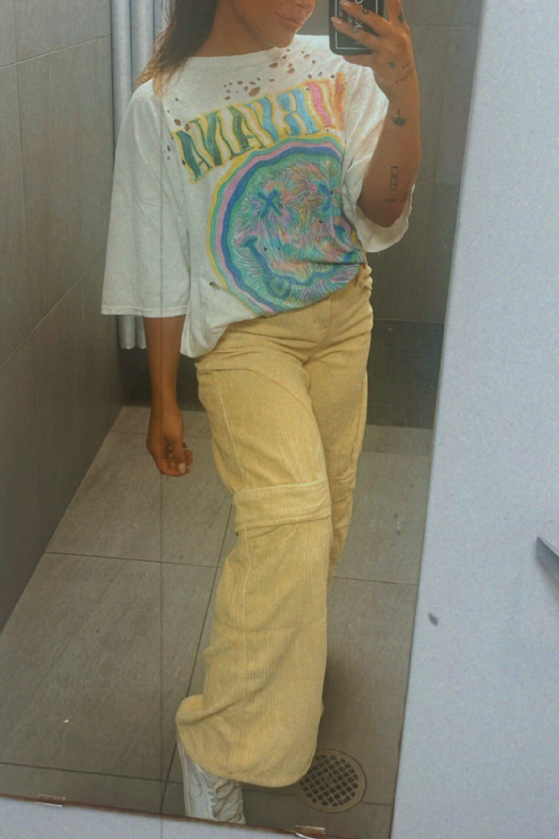 Oversized outfit to wear with sneakers! Brighten up your street style w/ urban outfitters all the way- this tee is long enough to wear as an oversized dress, and the pants are oversized and cute with crop tops too .. i have them in every color + the wide flare bottoms look soo cute with white airforces :)

#LTKstyletip #LTKSeasonal