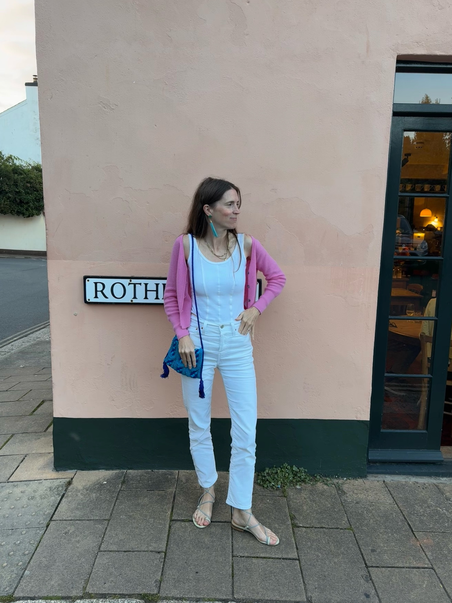 Casual date night outfit from my suitcase. A classic travel outfit = all white basics including my trusty, uber flattering white Levi’s + accessories with bright pops of pink and turquoise. 

The pink JCrew cashmere is from a couple seasons ago so swapped with an alternative - select cashmere is 30% off right now. 

The pants and tank are on Amazon!

These  scrappy sandals are my all time favorites. So chic. Can be dressed up or down. 

#LTKSeasonal #LTKTravel