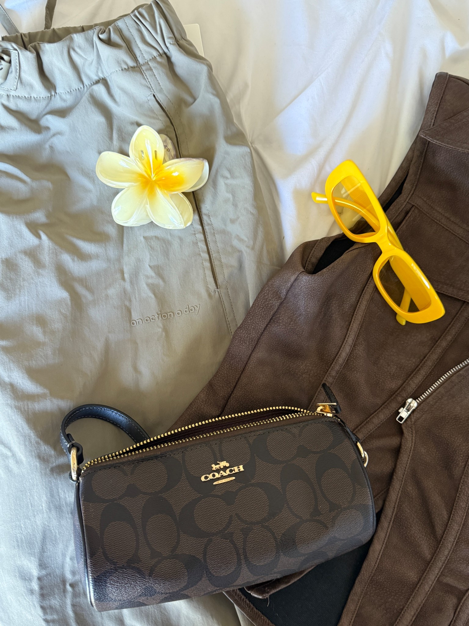 Luvv a mini Coach bag with a flower claw clip #accessories #coach #minibag #girlyaesthetic #summerpurse 

#LTKFindsUnder100 #LTKStyleTip #LTKSaleAlert