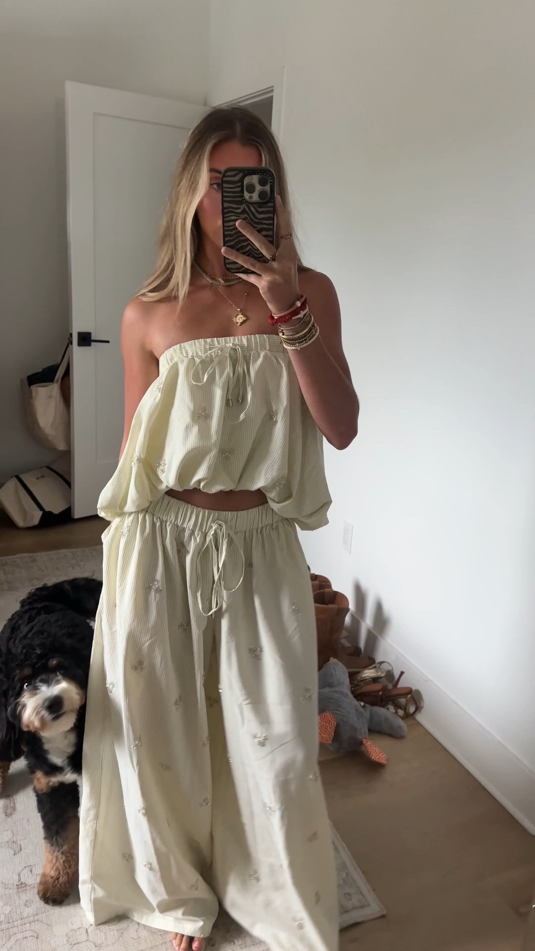 Beige striped strapless poplin blouse designed for sweet summer styling, brunch looks, and casual everyday wear. Crafted from a beige and white striped poplin material, this breezy blouse features an elasticized strapless neckline with adjustable drawstrings, a relaxed fit with gathered detailing, an elasticized hem, and a subtle high-low silhouette. Style with the coordinating AKIRA Label Light and Airy Poplin Pant for a chic matching look. @shopakira

#LTKootd #LTKdayinmylife #LTKSeasonal