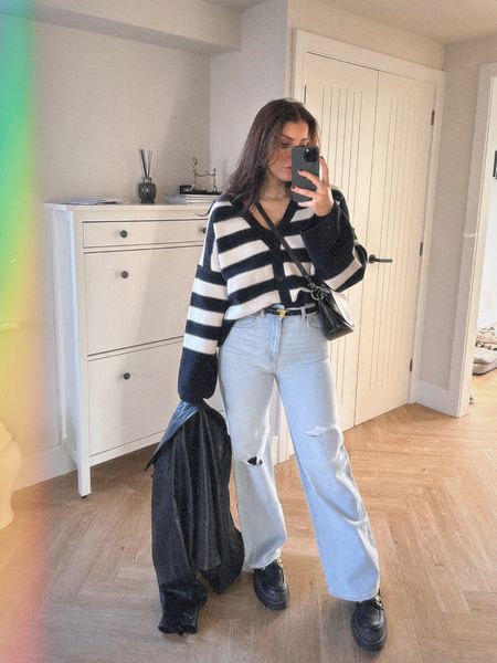Spring fashion 
Ootd
H&M outfit 
Striped cardigan 
Wide leg jeans
Chunky loafers 
Leather jacket 

#LTKshoecrush #LTKstyletip #LTKeurope