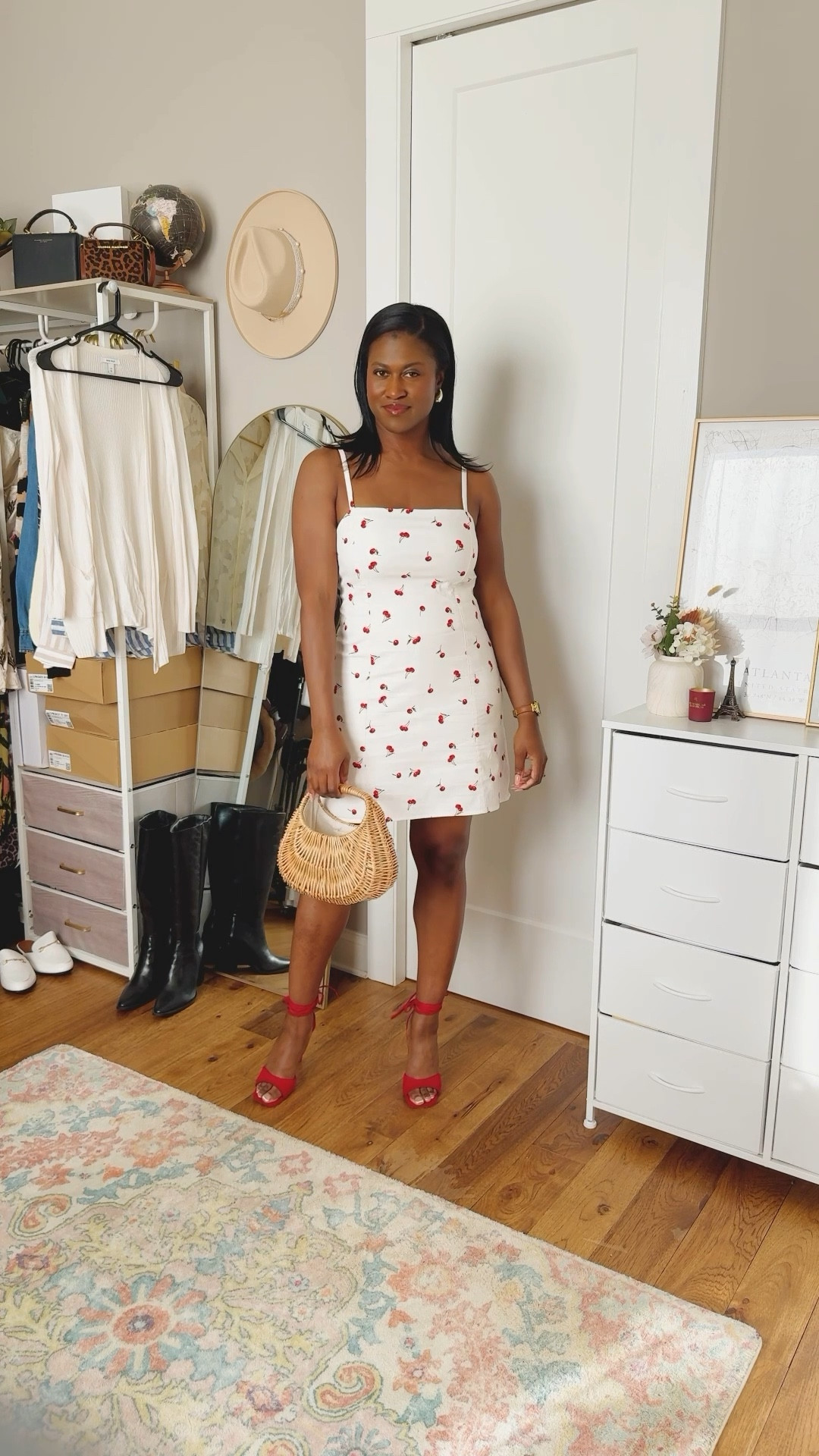 Sundress season activated! Stepping into spring like it’s my runway—cherry prints, red heels, sunshine, and main character energy only. Outfit details below! 🍒☀️😎

Dress - Abercrombie and Fitch Seamed Stretch Skort 
Shoes - Shoedazzle Salma Heeled Sandal
Earrings - Povic Teardrop Earrings
Bag - Few Moda Jane Handmade Bag
Fragrance - Kayali Eden Sparkling Lychee 
Lips - Summer Fridays Lip Butter in Poppy

#LTKStyleTip #LTKWatchNow #LTKMidsize