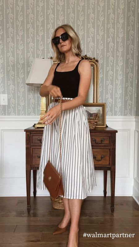 Small in knit tank (runs very small so I suggest sizing up)
Small in striped skirt 
Xs in striped button down
S in denim skirt 
S in black tweed skirt 
Xs in black and white dress 