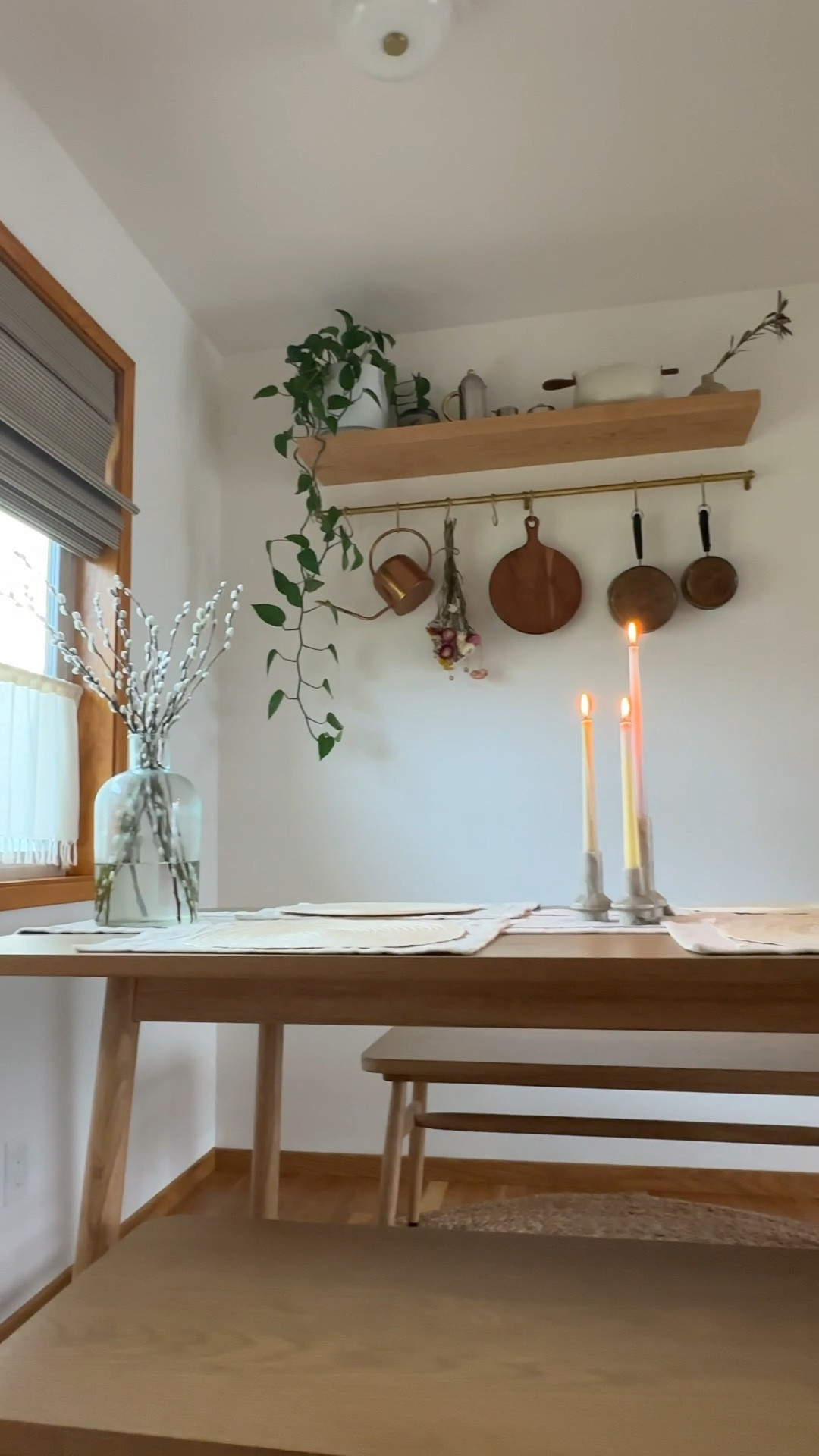 On cloudy days we love lighting our ombré candles and taking in all of the cozy feels at our dining table. 🌧️🥰💕 Featuring: Shaker Dining table, Shaker Benches and Chair, Ombré candles, Cutting Board, Glass Vase, Marble Candle Holder, Taper Candles, Brass Rail, Copper Pots, Ceramic Cookware, and Jute Rug. 

#LTKhome