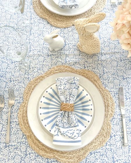 Loving everything about this blue and white, coastal table setting for Easter!

The beautiful tablecloth, scallop placemats, salad plates and napkins gifted by Cailini Coastal.
-
home decor, decor under 50, home decor under $50, coastal spring decor, spring decor under $50, spring decorations, spring home decorations, coastal decor, beach house decor, beach decor, beach style, coastal home, coastal home decor, coastal decorating, coastal interiors, coastal house decor, home accessories decor, coastal accessories, beach style, blue and white home, blue and white decor, neutral home decor, neutral home, natural home decor, easter decor, spring entertaining, blue and white plates, salad plates, dessert plates, easter tablescape, spring tablescape, coastal tablescape, coastal dining room decor, blue & white tablecloths, placesetting, white plates, white dishes, blue & white plates, salad plates, woven napkin rings, large white vases, spring flowers, pink hydrangeas, easter decor, woven placemats, dining room decor, blue and white napkins, cloth napkins, spring napkins, long tablecloth, cailini coastal decor

#LTKSeasonal #LTKstyletip #LTKhome