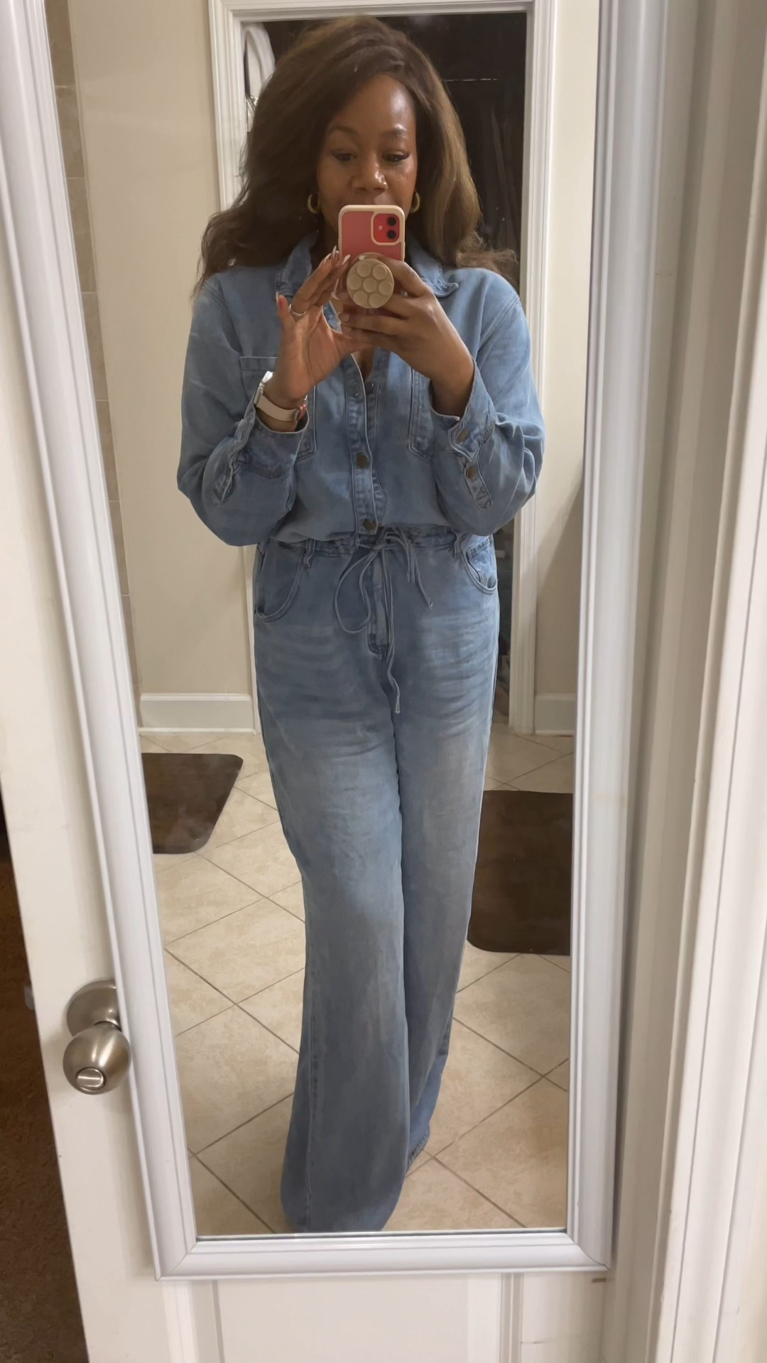 I’m a busy mom, wife, and employee—I don’t always have time to piece together the perfect outfit, which is why I’m obsessed with this denim jumpsuit! It gives total Canadian Tuxedo vibes but in a single piece.
Fit Tip: I’m wearing a 2X (sized up from my usual 1X) because I wanted that extra length for my heels. The adjustable drawstring waist is a game-changer for cinching it in and getting that perfect curvy silhouette!
Shop the Look: While this exact one is currently in my archives, I’ve done the digging for you! I’ve linked several other denim jumpsuits in the app that are so good I’d add them to my own closet in a heartbeat. They have that same effortless vibe and curvy-friendly fit we love.

Curvy denim jumpsuit, spring transitional style, mom-friendly outfits, wide leg denim, Canadian tuxedo trend, tall girl friendly, work from home style, outfit ideas for moms, denim on denim, curvy girl fashion finds

#LTKTall #LTKootd #LTKMidsize