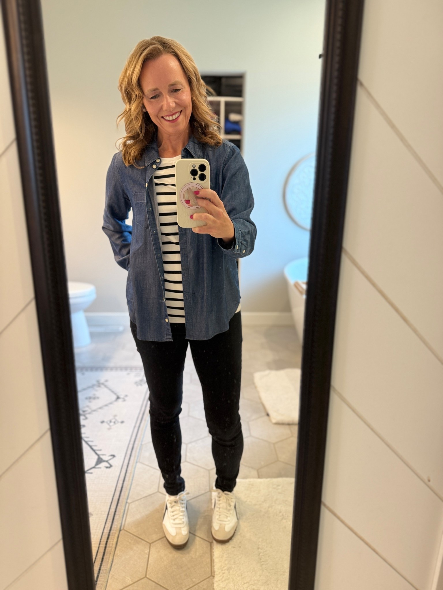 Grabbed this affordable tshirt in a classic stripe and paired it with this chambray shirt, black jeans and some comfy sneakers for a casual workday fit.  

Tshirts fit true to size and so many color options.  I plan to order more! 

I’m in medium and love the length and feel of these!  

#LTKMidsize #LTKOver40 #LTKFindsUnder50