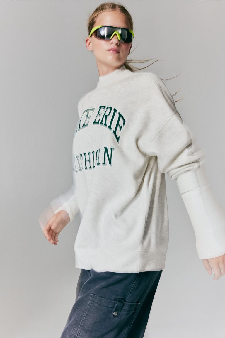 Oversized motif-detail sweatshirt - Light grey marl/Lake Erie - Ladies | H&M GB | H&M (UK, MY, IN, SG, PH, TW, HK)