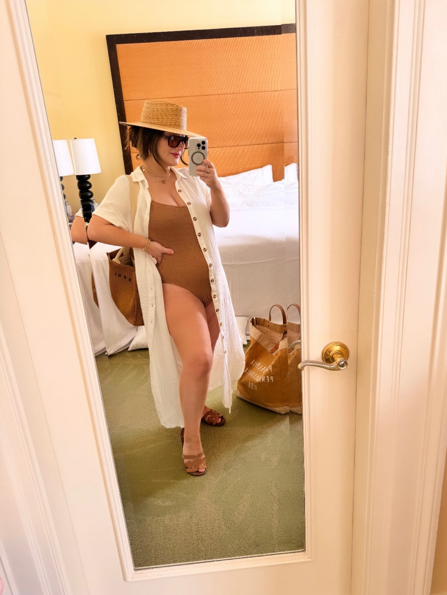 Swim is bump friendly! I ordered this 1.5 years ago in hopes that it would fit when i got pregnant, and it does!! It’s a “one size fits all” which i usually don’t like but this one is so stretchy it’s great!

Coverup size small
Hat size sm/med

#LTKswim #LTKbump #LTKstyletip