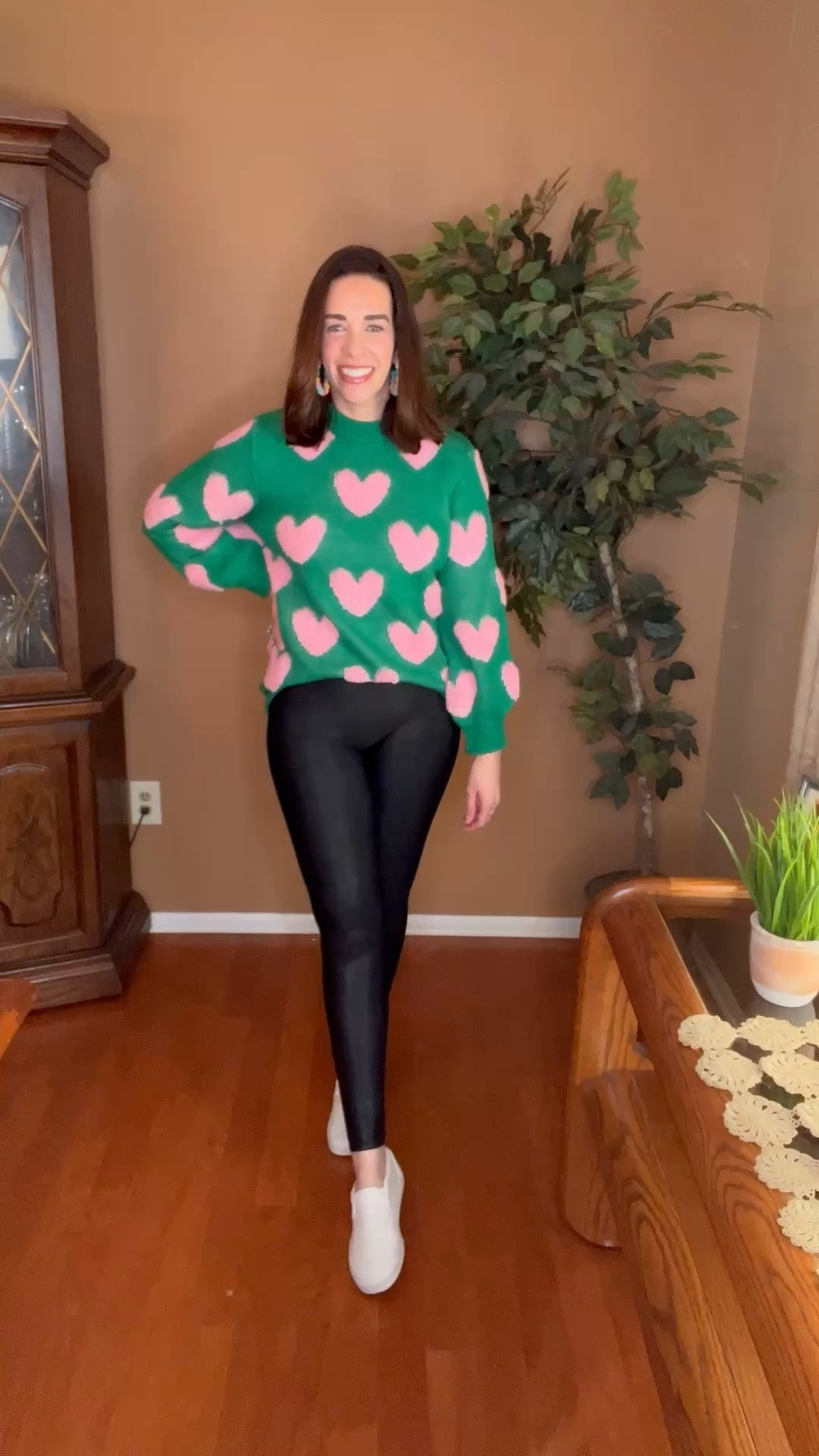 Green heart sweater (xs). Black faux leather leggings (s). White slip on sneakers (8.5). #sweater #greensweater #heartsweater #leggings #fauxleatherleggings #blackleggings #sneakers #whitesneakers #sliponsneakers #springoutfit 
spring outfits 2026 

#LTKSeasonal #LTKootd