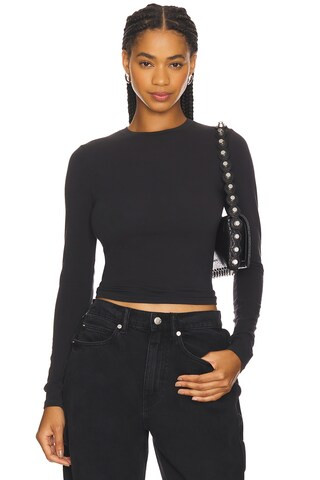 SKIMS Cotton Jersey Long Sleeve T-Shirt in Soot from Revolve.com | Revolve Clothing (Global)