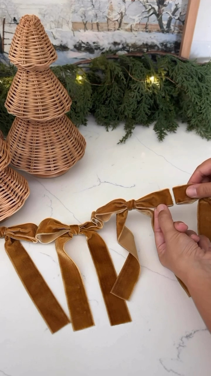 A DIY viral bow garland! These sell out so fast, so I made my own! It's so easy & all you need is a favorite pack of bows & hot glue 🙌🏽🎀

#LTKHoliday #LTKHome #LTKSeasonal