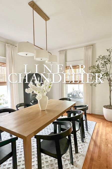On sale!! The most beautiful shaded linear chandelier! 

It really makes a statement being 49 inches long and the clean linear line with the off white linen shades make is extra stunning.   They have three finish options to choose from as well, gold (shown here), brushed nickel, and black iron. 

The quality is amazing while also being super affordable for a light this size!  It’s currently on sale too, usually $399 but now $339! 👏🏻

(Linking chairs, 7ft olive Tree and Arched Cabinet here too - all affordable as well🫶🏻)

Linear Light | Chandelier | Home Finds | Affordable Home Finds 

#LTKsalealert #LTKhome