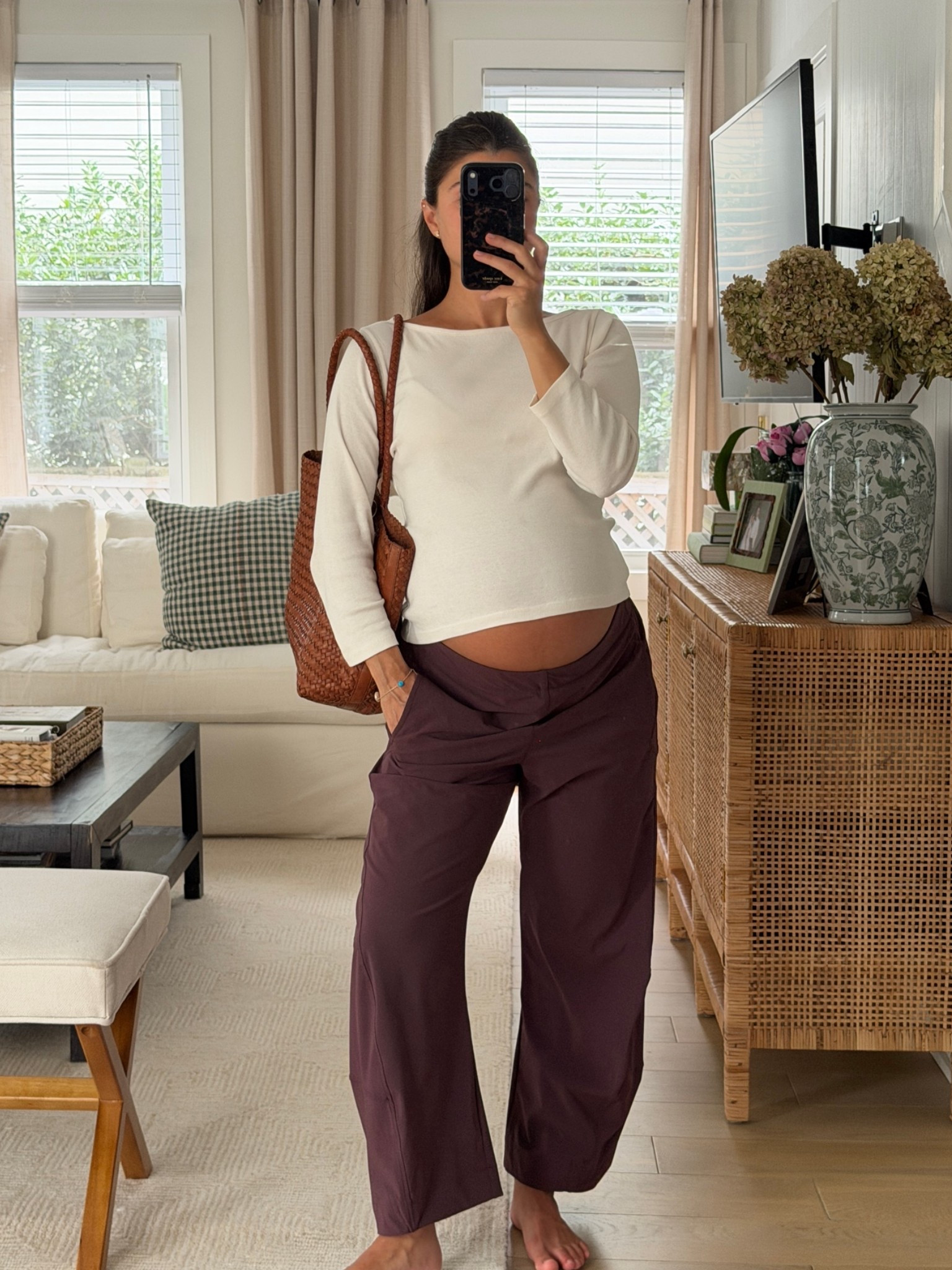 pants on sale! They are pricey but SOOO comfortable, don’t wrinkle, and extremely flattering. They are not maternity specific. I’m wearing 8petite, currently 33 weeks pregnant but been wearing since second trimester (haven’t changed size). Color: aubergine