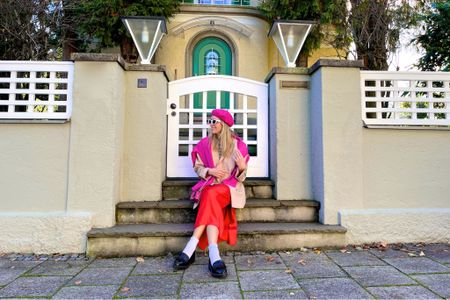 Pink Red. Fashion and Style Blog Girl from Heartfelt Hunt. Girl with blonde hair wearing a pink beret, red slip dress, pink sweater, pink mini bag, white cat-eye sunglasses, oversized blazer, striped tee and loafers. #colorfuloutfit #colorfulstyle #colorfulfashion #colorfullooks #fashionfun #cutefalloutfit #fallfashion2022 #falllookbook #fitcheck #dailylooks #dailylookbook #contentcreator #microinfluencer #discoverunder20k