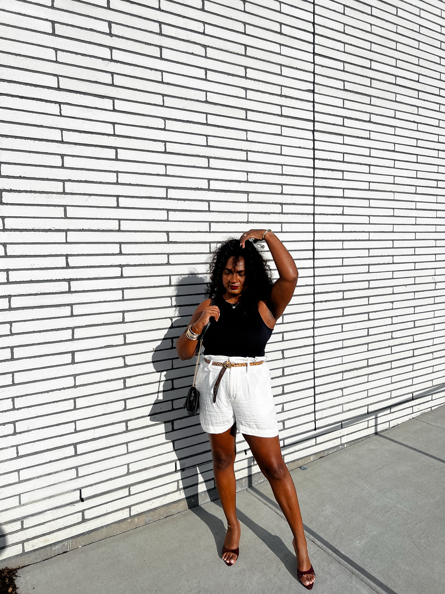 I never get tired of black and white with a hint of color 💋 

Pro tip: If you want to give the illusion of a smaller waist, wear a dark top with a lighter bottom. This instantly slims your waist and creates an hourglass effect. 

#LTKStyleTip #LTKMidsize #LTKShoeCrush