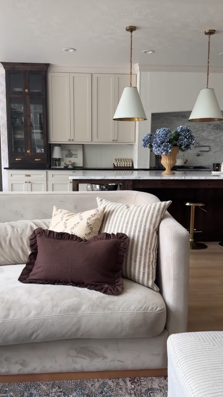 Does renovating my 90’s colonial make me an artist?? 😉 There have been rooms in my home that I felt like I haven’t gotten right, but I have never felt this way with my kitchen. I went with classic creamy cabinets with walnut island and hutch and love how they matched up. Let me know if you any questions on this space and follow along if you love a classic transitional home!  Kitchen, kitchen renovation, before and after, neutral kitchen, cream cabinets, walnut stain, Beadboard backsplash, unlaquered brass, luxury kitchen, collected home.  #kitchenremodel #kitcheninspiration #nancymeyersaesthetic #beforeandafter #luxurykitchen