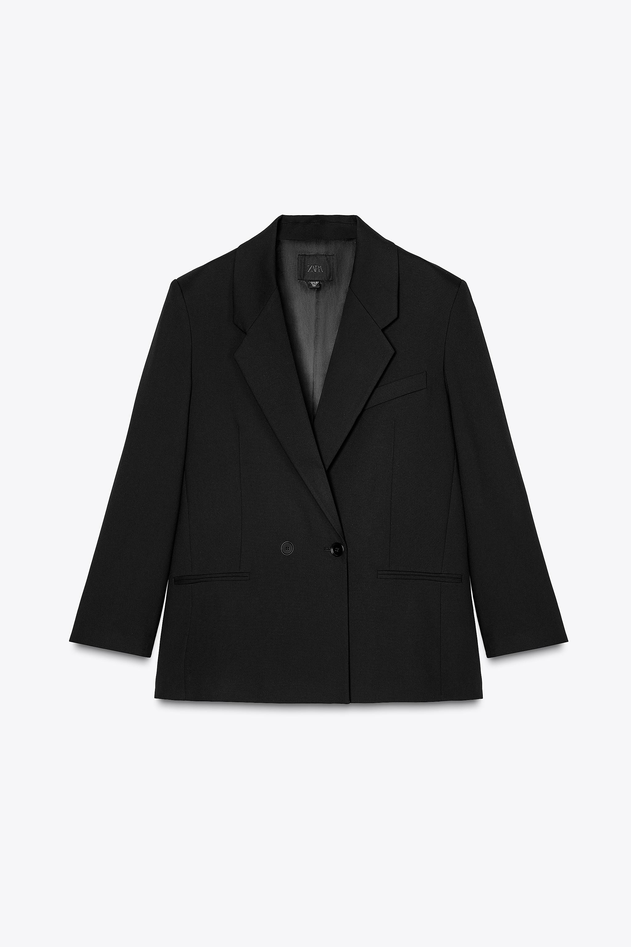 Oversized blazer with lapel collar. Long sleeves with shoulder pads and dropped shoulders. Front ... | Zara US