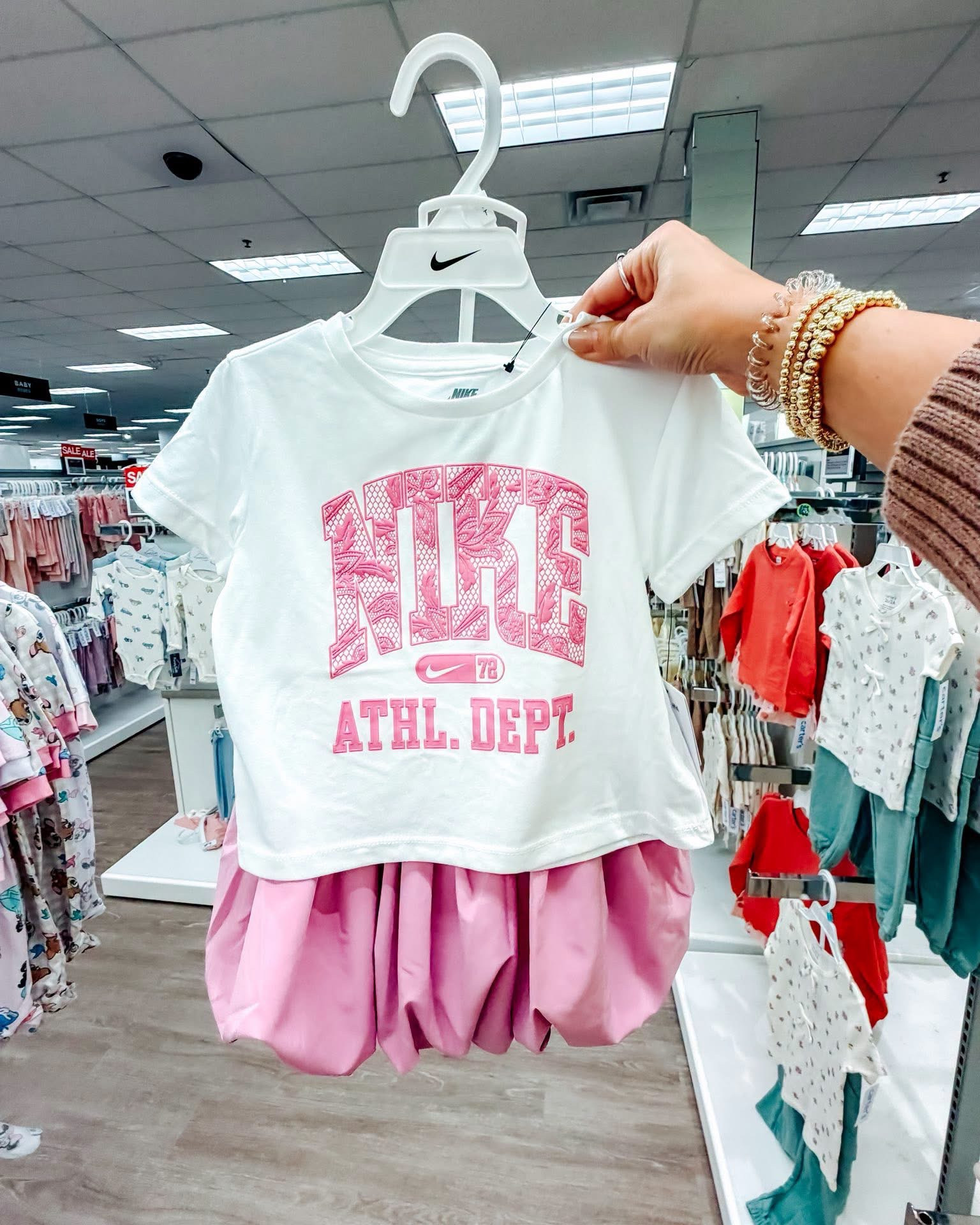 The little girls section at Kohl’s is absolutely delivering 💗🏃‍♀️ From leopard swooshes to bubble skirts, these Nike sets are way too cute. Somebody tell me why kids have better outfits than adults?! 😍

#KohlsFinds #NikeKids #ToddlerStyle #GirlsFashion #MomFinds

#LTKKids #LTKootd