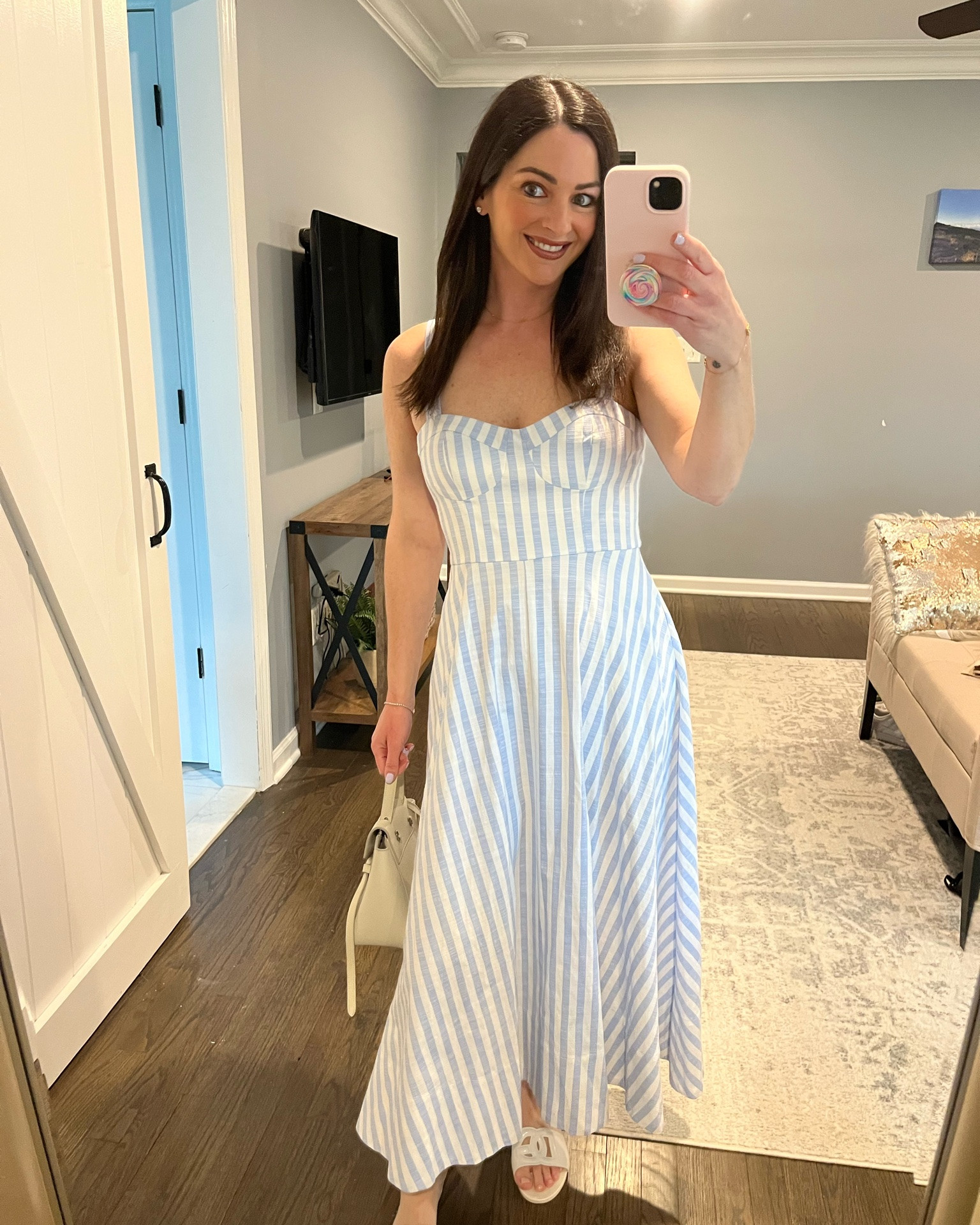 Memorial Day weekend = officially dress season ☀️👗 Sharing some of my favorite summer dress finds lately — from easy throw-on maxi dresses to flattering midi styles, casual everyday dresses, and the kind of pieces you’ll want to wear on repeat all summer long 

The summer dress I know I’ll be reaching for on repeat ☀️🤍 This blue and white striped midi dress is one of those effortless pieces that makes getting dressed so easy. The built-in bra cups mean no extra layers or uncomfortable strapless bras — just throw it on and go 👏

I’m obsessed with the flattering midi length because it works with everything from sneakers and sandals to heels, making it perfect for brunch, vacations, baby showers, summer parties, date nights, and basically every warm-weather occasion on my calendar. The fit is so comfortable, the stripes feel timeless, and it instantly looks put together with minimal effort 🙌🏻



If you’re looking for an easy summer outfit idea that’s comfy, versatile, and chic… this dress is it. I’m wearing a size Small



#SummerDress #MidiDress #SummerStyle #DressSeason #VacationStyle

#LTKPetite #LTKTravel #LTKmomlife