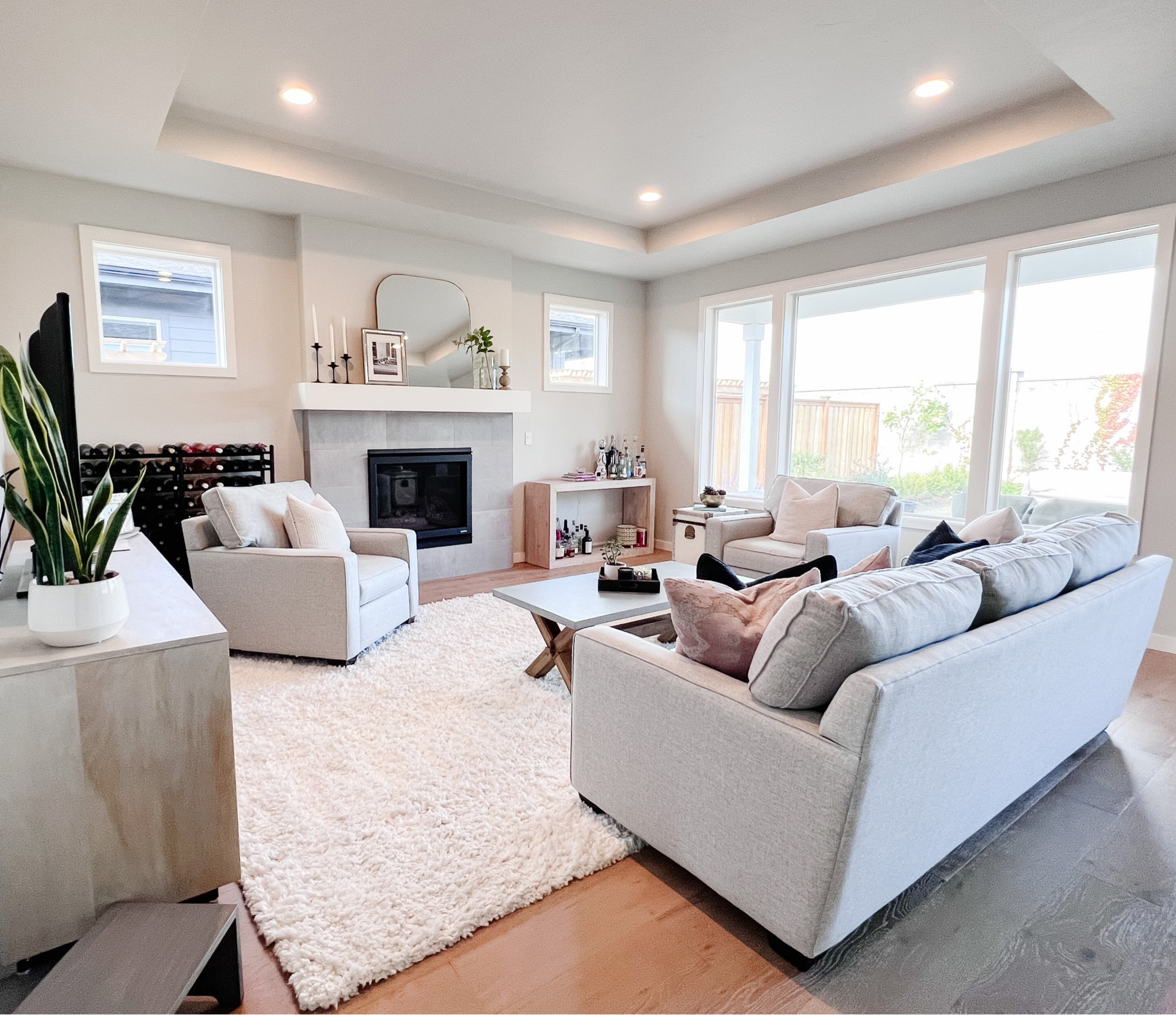 Update your living room space with a fuzzy white shag carpet to warm up the room. Add an arched mirror for mantle decor.

#LTKsalealert #LTKhome #LTKfamily