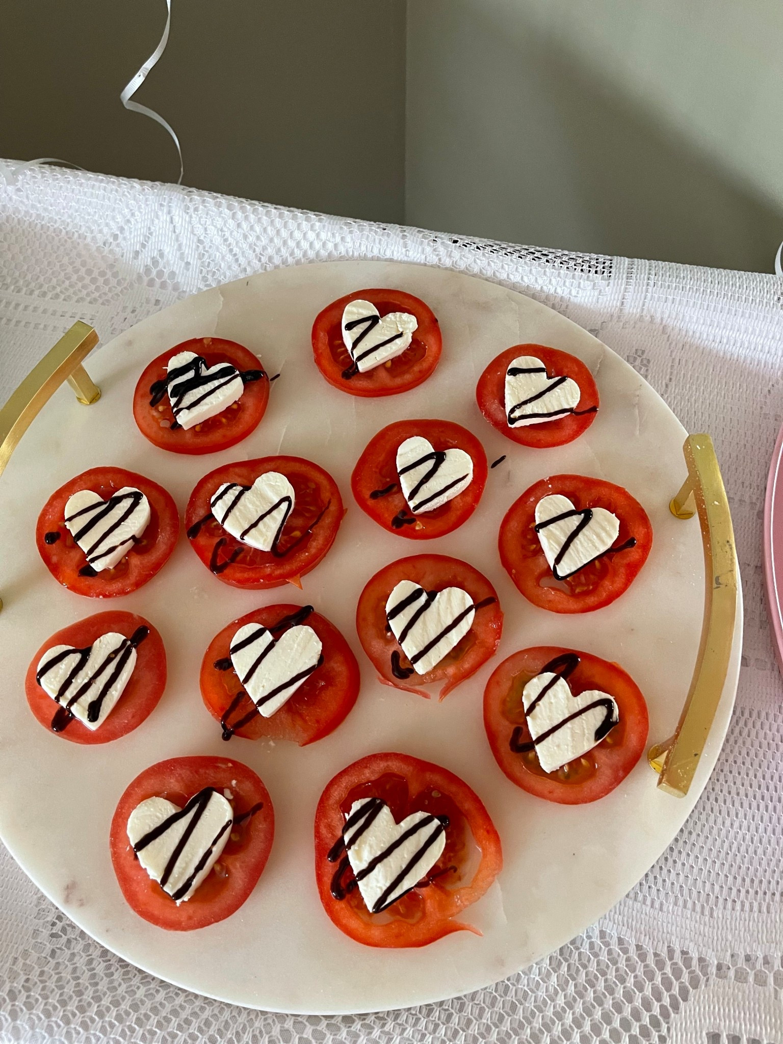 Easiest Valentine’s Day appetizer!
• slice tomatoes, pat dry
• slice mozzarella 
• cut mozzarella slices with small heart shaped cookie cutter
•drizzle with balsamic 
•option add basil for some color!

Serve these at your Galentines day party! 

Valentines inspiration, Galentines ideas 

#LTKValentine #LTKHome #LTKSeasonal