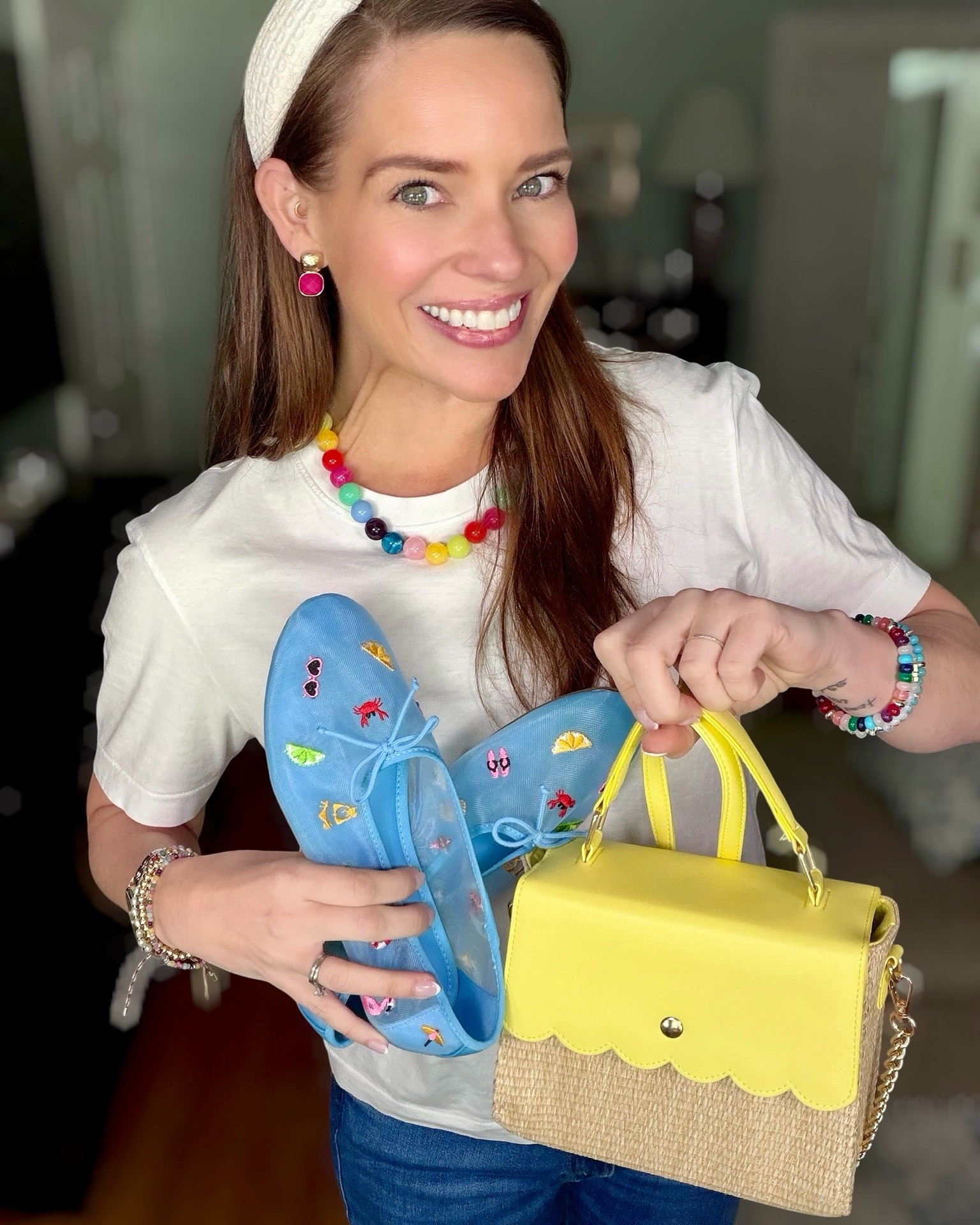 Colorful Summer Accessories 🌈 Statement Necklace, Fun Flats & Raffia Bag

Taking a simple white tee and jeans up a notch with the cutest colorful accessories 🌈✨ Styled this easy everyday outfit with a rainbow statement necklace, stacked BaubleBar bracelets, bright pink earrings, whimsical embroidered mesh flats, and the sweetest yellow scalloped raffia bag for a fun preppy summer look 💖💛💙

I love how these colorful pieces instantly make basics feel styled and playful — perfect for errands, brunch, casual summer days, vacations, or when you want your outfit to feel a little extra fun ☀️ The embroidered blue flats are such a conversation piece and the yellow woven bag adds the happiest pop of sunshine 💛✨

A classic white crewneck tee and jeans make the perfect base for colorful accessories that really steal the show 🎀

Colorful summer outfit, white tee and jeans outfit, rainbow necklace, BaubleBar bracelets, colorful accessories, embroidered flats, mesh ballet flats, raffia handbag, yellow purse, preppy summer style, casual chic outfit, bright accessories, everyday summer outfit 🌈🩵💛

#LTKOver40 #LTKPetite #LTKootd