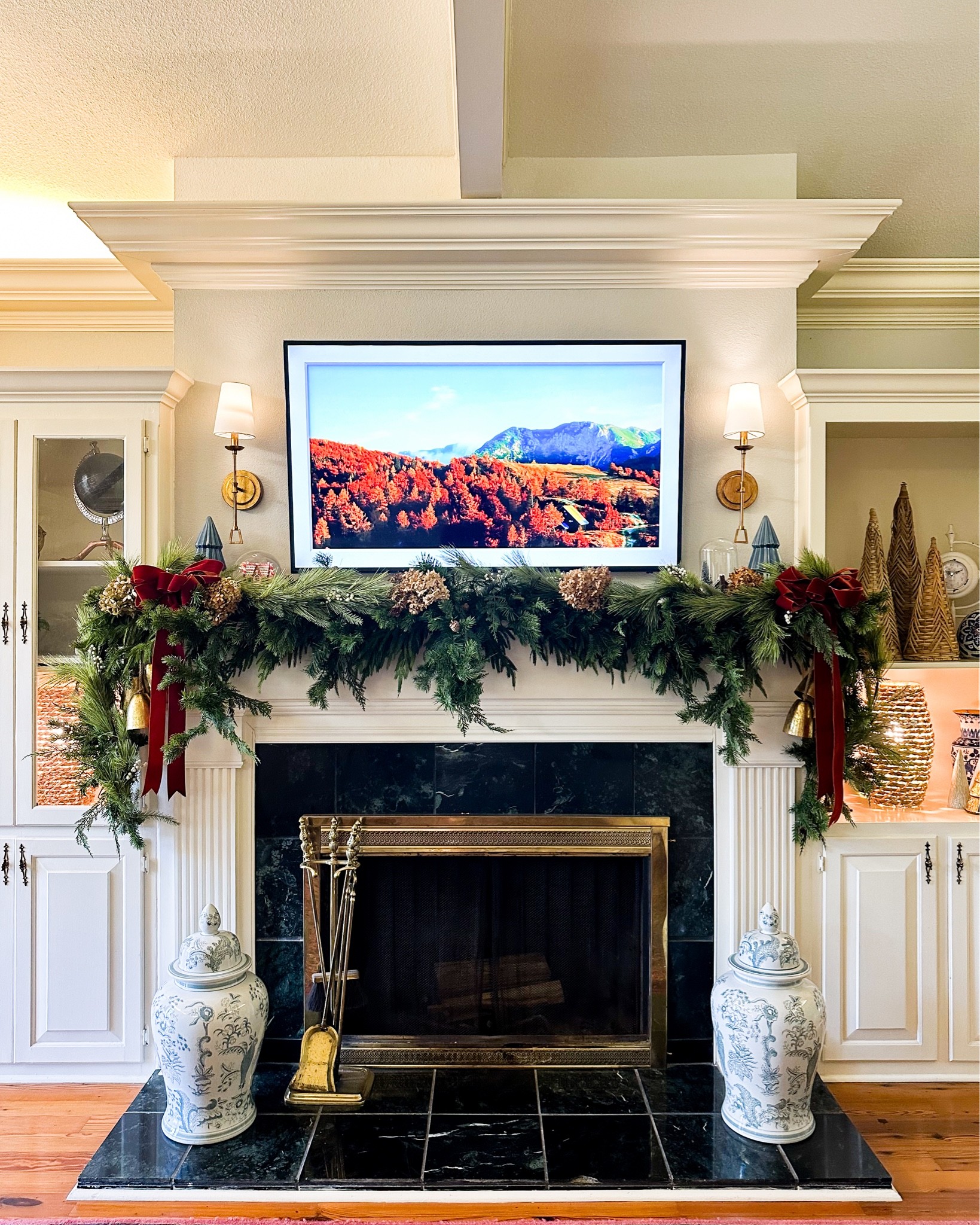 Christmas Mantle Ready! Wall sconce, grandmillennial decor, Christmas bows, Christmas trees

#LTKSeasonal #LTKhome #LTKHoliday