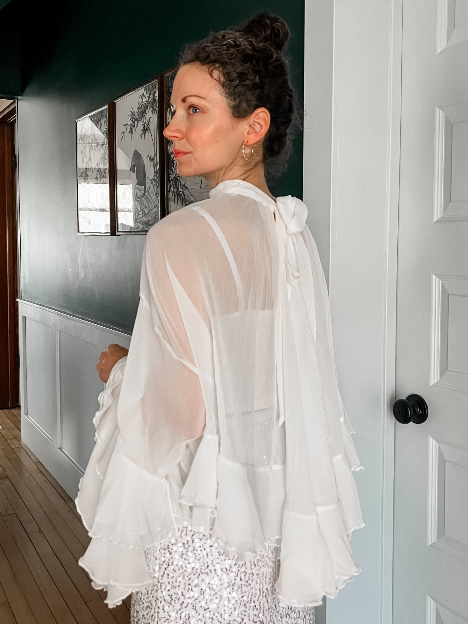 A statement top for summer!
White chiffon statement top from Chicwish. 
Sequin skirt from Chicwish. 
Crystal hoop earrings from a local boutique, linking similar. 
Cropped lace top from Amazon. 
Petite outfit. Neutral outfit. Summer outfit. Party outfit. Modest outfit. 
