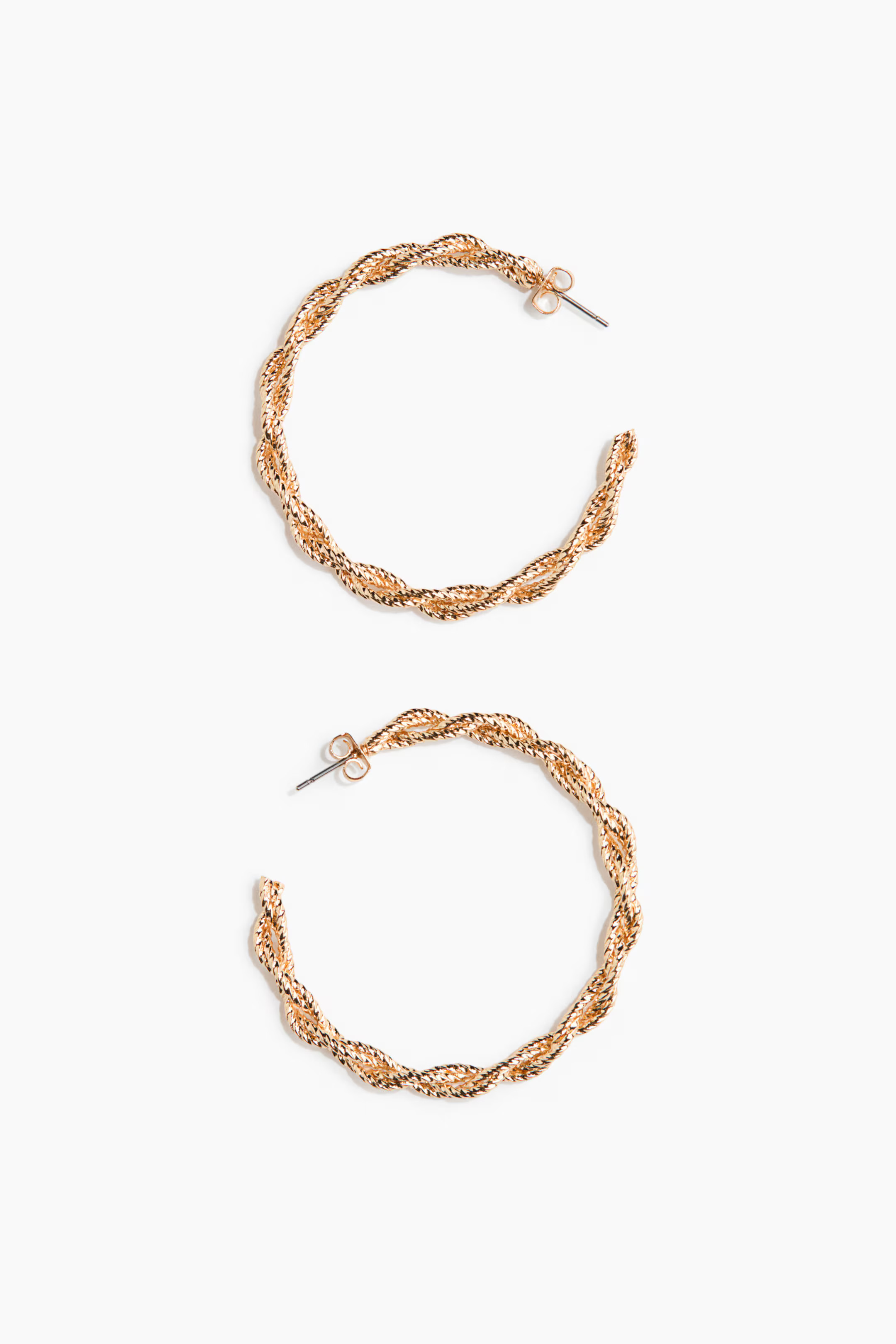 Hoop-Ohrringe in gewundenem Design | H&M (DE, AT, CH, NL, FI)