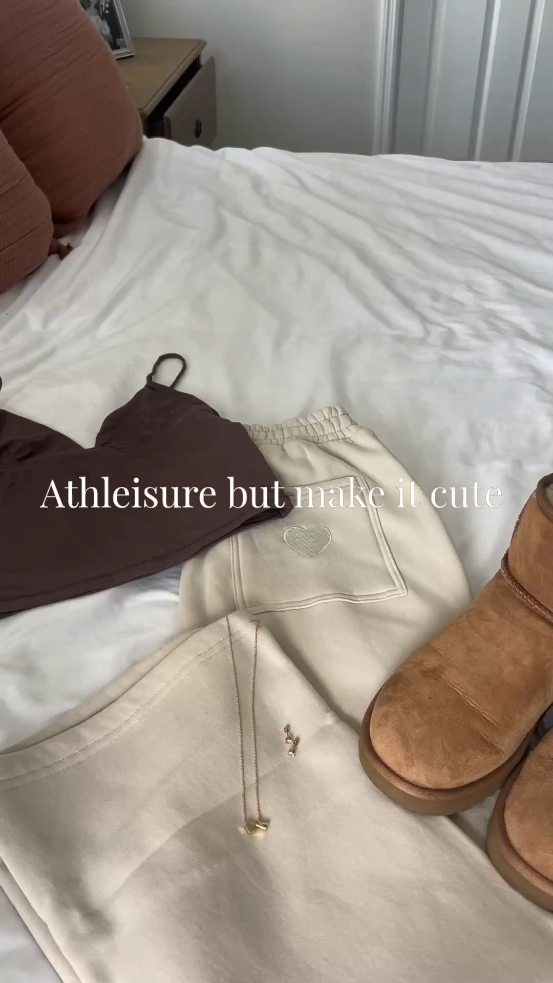 Chocolate, cream, and a little gold moment 🤎☁️✨

An easy brown skims dupe with cozy cream sweats, styled with chestnut mini Uggs, a chocolate mini bag, and classic gold jewelry. The kind of athleisure look that feels effortless but still pulled together 💅🏻

Perfect for coffee runs, errands, travel days, or just staying in and feeling cute… pieces that do both 🤍☕️

#athleisurestyle #neutraloutfit #cozyathleisure #everydayoutfitideas #comfyandcute #neutralstyleinspo #uggstyle #effortlessoutfit #casualstyle #errandoutfit #cozyvibes #athleisurewear

#LTKU #LTKActive #LTKootd
