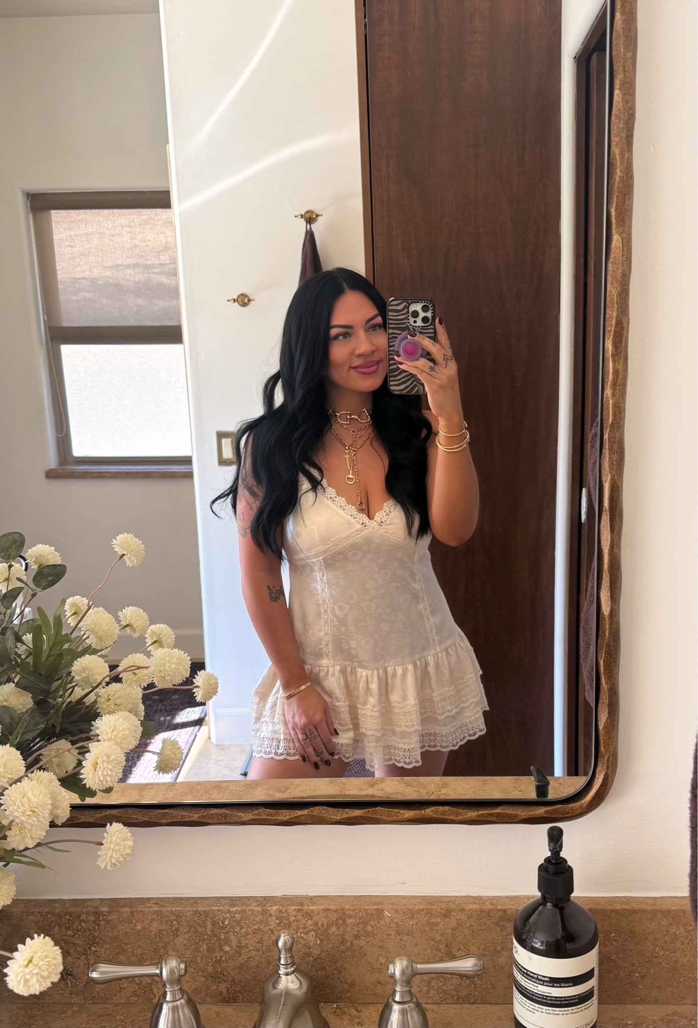 love this top that doubles as a dress 🤍 wearing a size medium!