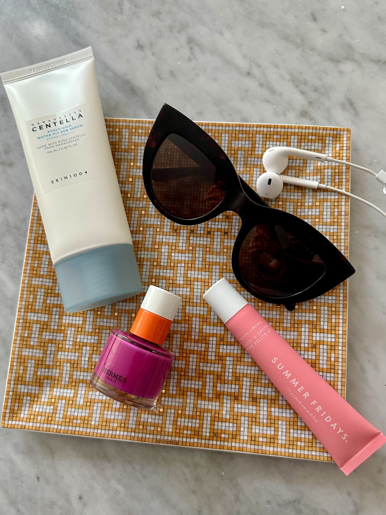 Summer on a plate ☀️

Lip balm by Summer Fridays
SPF by Skin1004
Sunglasses by Ace and Tate
Nail polish and plate by Hermès

#LTKselfcare #LTKHome #LTKBeauty