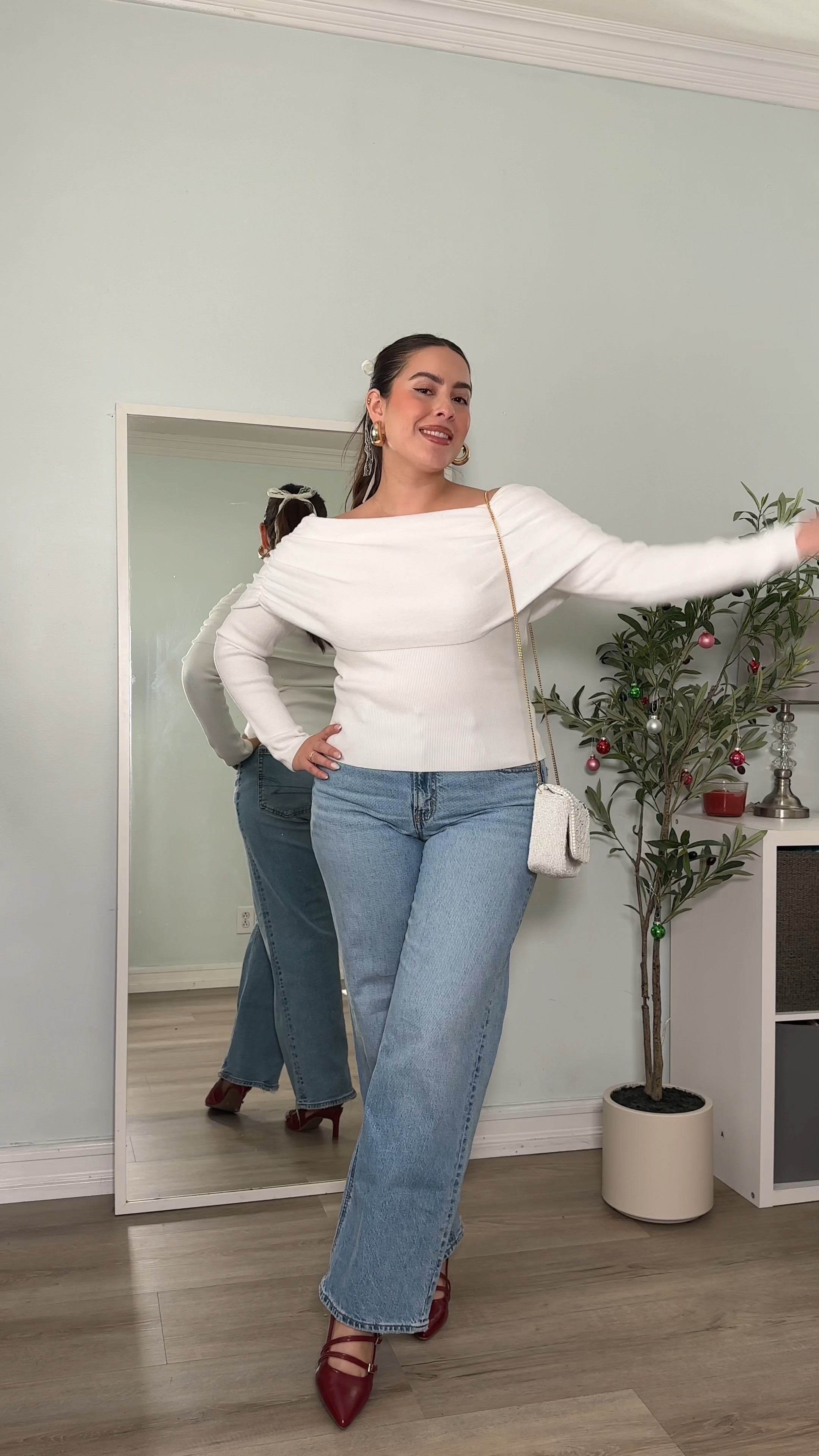 White off the shoulder top, jeans, and red heel 

#LTKHoliday #LTKParties #LTKSeasonal