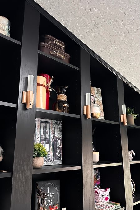 Bookcase styling | bookshelves styling | bookcase decor | bookshelves decor | black bookcase | black bookshelves | ikea bookshelf | IKEA Billy | home decor | living room decor | rechargeable lighting | wireless lighting | wall light


#LTKfamily #LTKhome #LTKGiftGuide