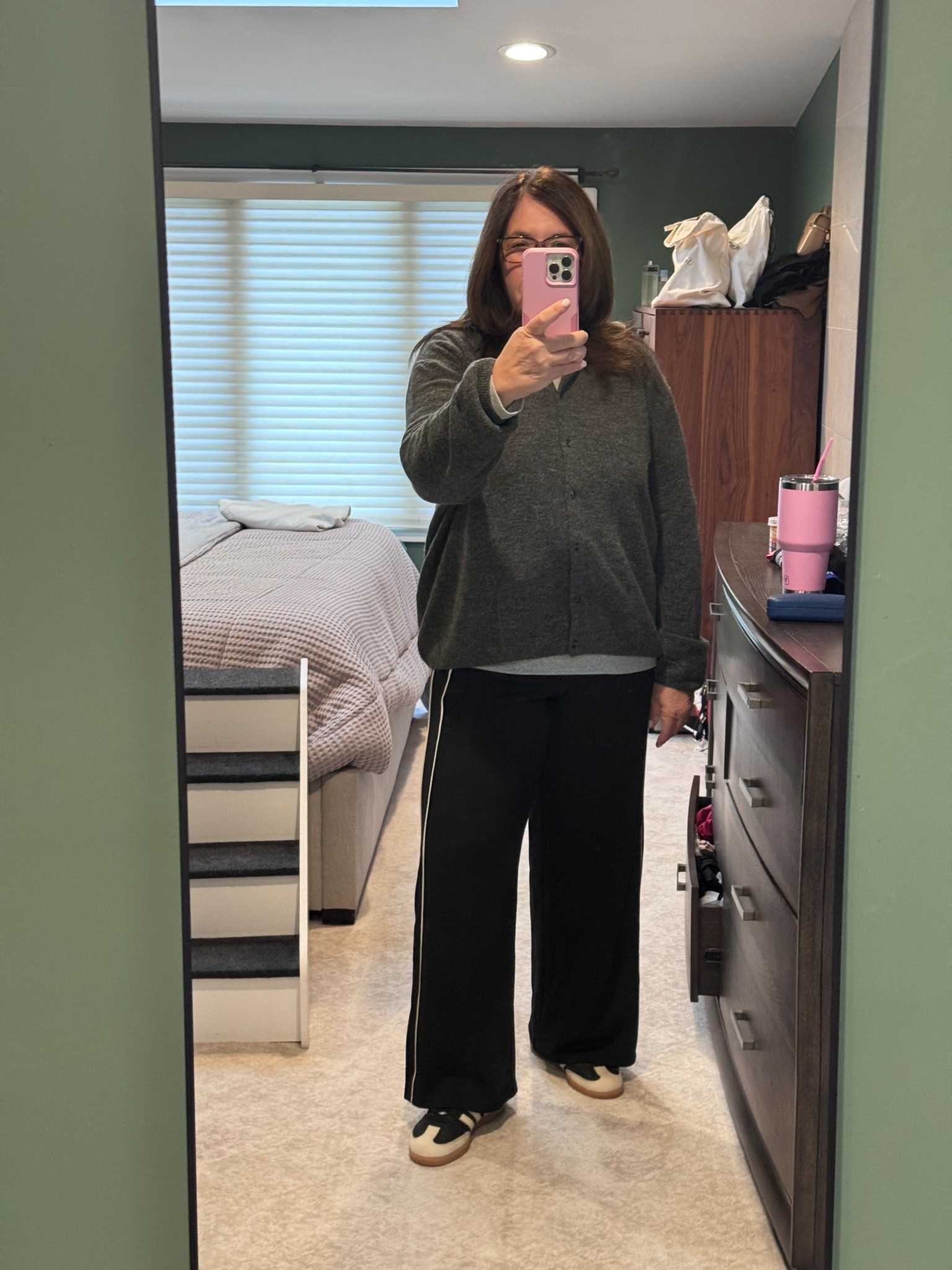 I dont know what to wear anymore. It was 75 degrees yesterday and now its snowing outside!!  So i decided to wear track pants with a button down sweater and my sambas. 

#LTKPlusSize #LTKMidsize #LTKootd