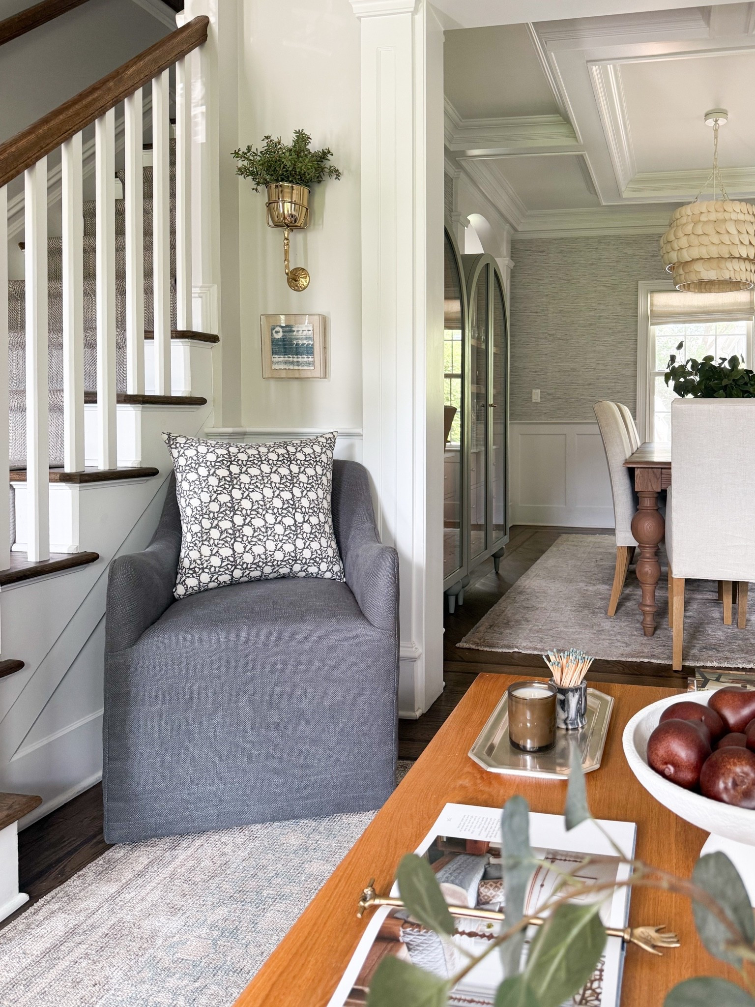 One of my favorite design tricks is giving an overlooked corner a purpose. This little nook under the stairs didn’t need much, just a comfortable chair, a statement sconce, a soft pillow, and a piece of artwork to turn it into a quiet place to pause. It’s proof that you don’t need a dedicated room to create a cozy reading or coffee spot.

accent chair, cozy reading nook, under stairs décor, wall sconce, home décor ideas, cozy corner, reading corner, neutral home, interior design inspiration, Girl on the Hudson

#LTKHome #LTKSeasonal #LTKmomlife