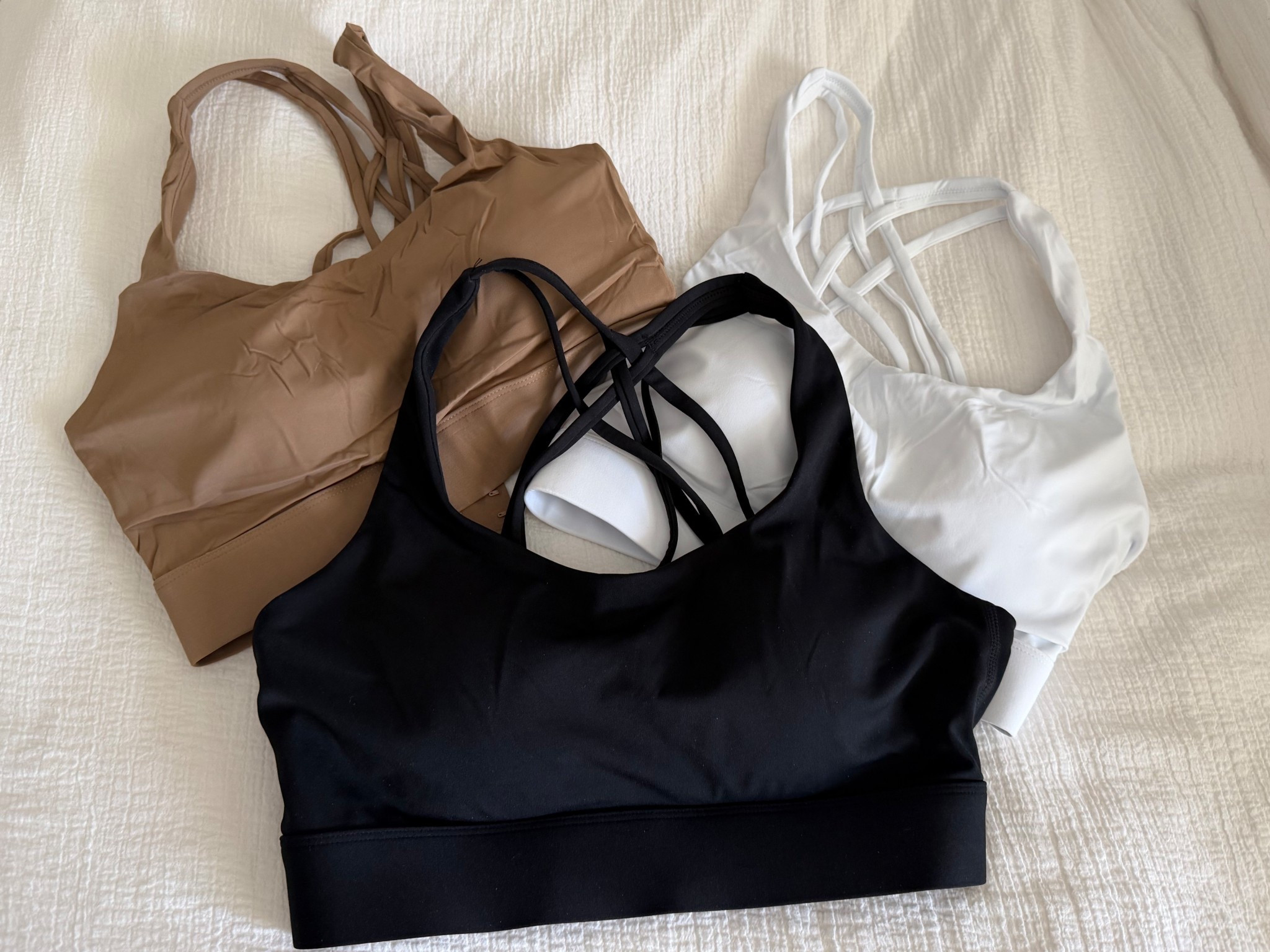 Best sports bra! 
Adjustable wide band, molded cups, cute strappy detail! 

I wear a Medium. I am 34 C

#LTKfitnessgoals #LTKActive #LTKFindsUnder50
