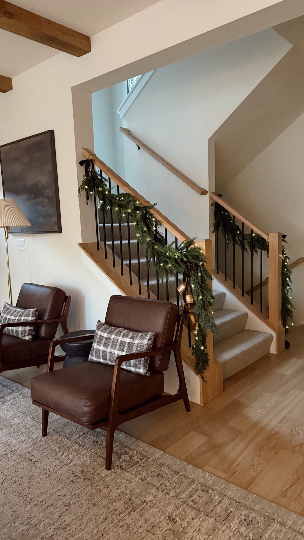 I’m a sucker for railing garland 😍 I combined the 2 linked below to create this look, and secured with these super easy twist ties that blend in with our railing (I believe they come in more colors, too)! Added some little fairy lights, velvet bows and bells 🔔🎀✨

Exact chairs are from Poly & Bark but I linked probably the exact chair (likely the same manufacturer)!

#LTKFindsUnder50 #LTKHome #LTKHoliday