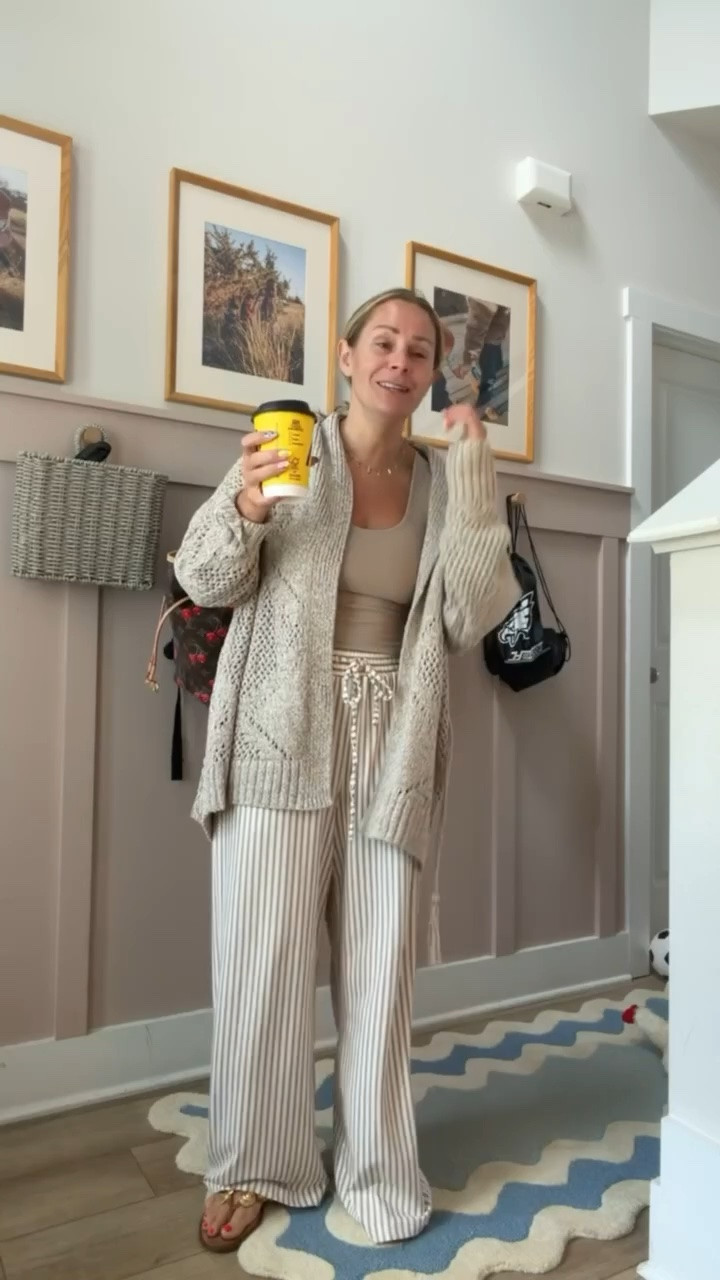 This lightweight knit cardigan, ribbed tank, striped wide-leg lounge pants, and comfy sandals are the perfect mix of elevated and effortless. Whether you’re running errands, grabbing coffee, or working from home, this is the kind of outfit you’ll wear on repeat.

#LTKStyle #NeutralStyle #CozyOutfits #WideLegPants #LoungeWear #CardiganStyle #CasualChic #EverydayOutfit #PetiteStyle #AmazonFashion