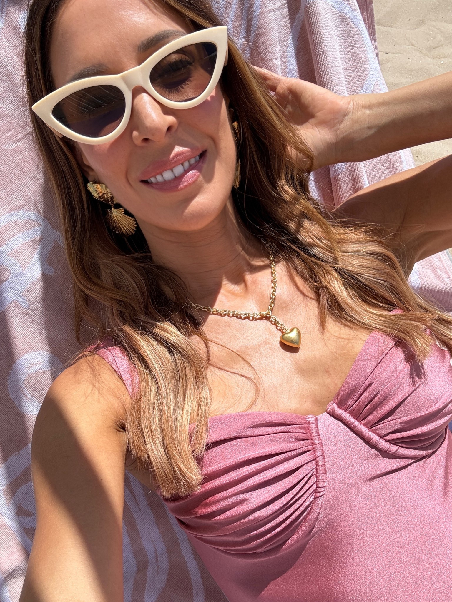 Pink swimsuit look 💘🌞💫

Pink Chloe earrings heart necklace 

#LTKstyletip #LTKsummer #LTKuk
