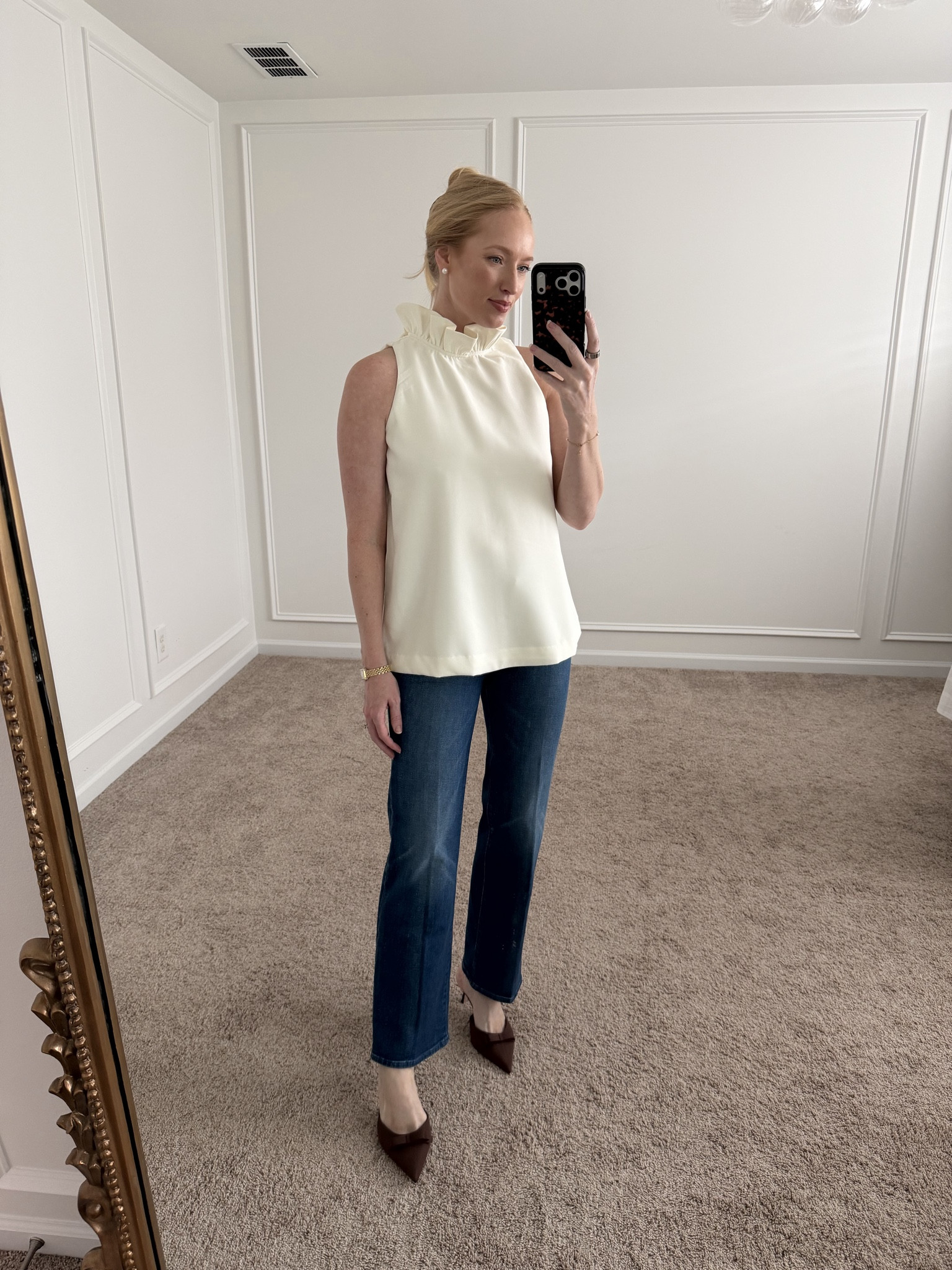 This fun ruffle neck top has a gorgeous oversized bow tie detail in the back. Wearing a size small and size 27 in the straight leg jeans  

#LTKStyleTip #LTKSeasonal