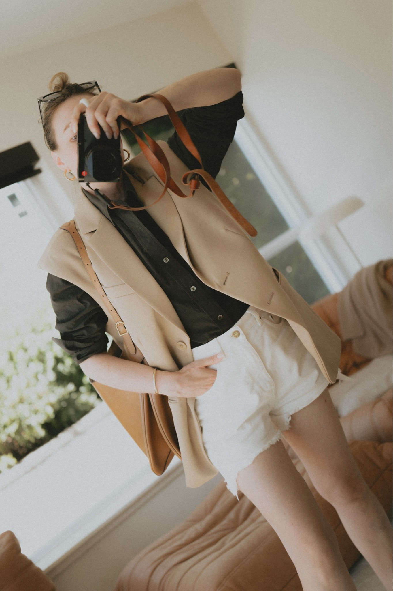Fall weather has stepped aside for a little bit: 
Cutoff shorts + button down shirt + sleeveless blazer + hobo bag. 
Shoulder hobo bag: Polo Ralph Lauren Polo ID
Shorts: Golden Goose 🪿 
Shirt: Buck Mason
Vest: Anine Bing

#LTKootd #LTKSeasonal #LTKWorkwear