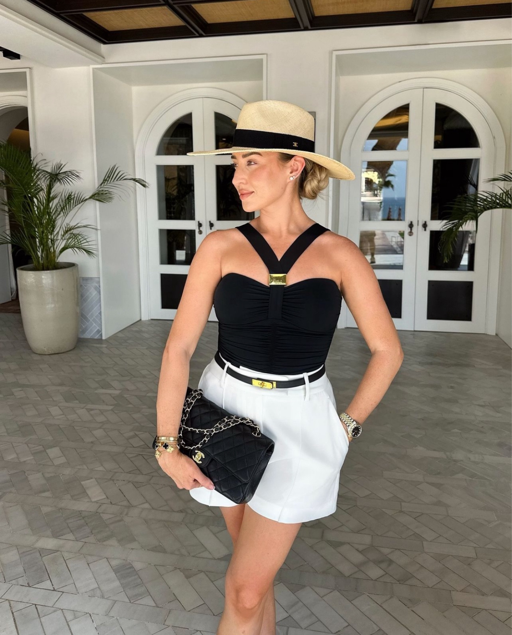 Me & Monochrome 🖤🤍 black halter neck swimsuit giving all the elegant timeless vibes with white shorts and black accessories 

#LTKluxury #LTKeurope #LTKsummer