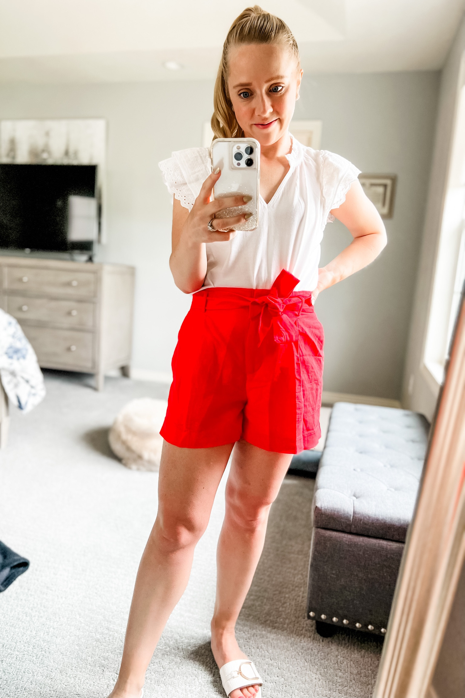 Love red paper bag shorts for the 4th of July! Wearing 4 petite. Similar ruffle sleeve tops.

4th of July. July 4th. Summer outfit. Red shorts. Petite. Paperbag shorts. Belted shorts. Women’s shorts. 