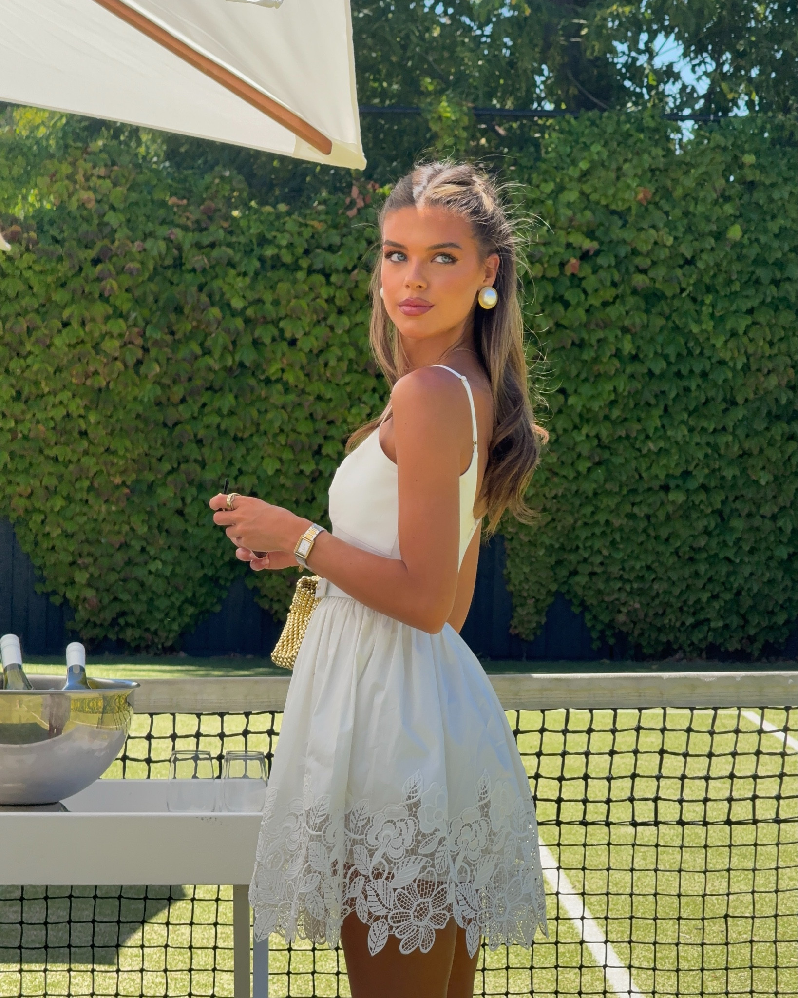 The perfect white mini dress !! I wear a size 4 (usually a 6, but I sized down for this one) 