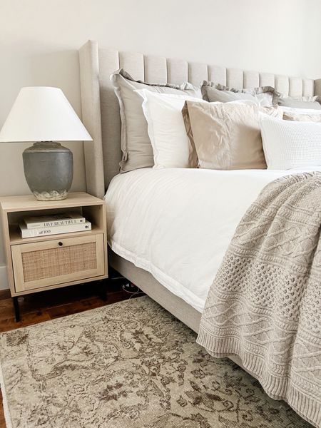 Neutral bedroom, beige bedroom, home decor, vintage rug. Neutral rug, white bedding. Cane nightstand, affordable nightstand. 

#LTKhome #LTKFind